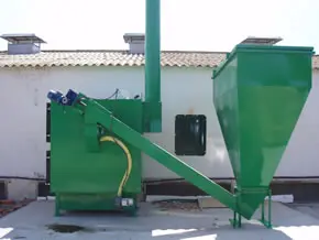 Caldera de biomasa modelo CBS400 con tolva y sinfín para granjas